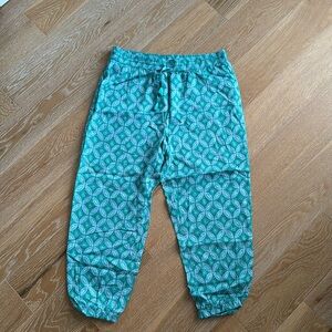 Green patterned pants.